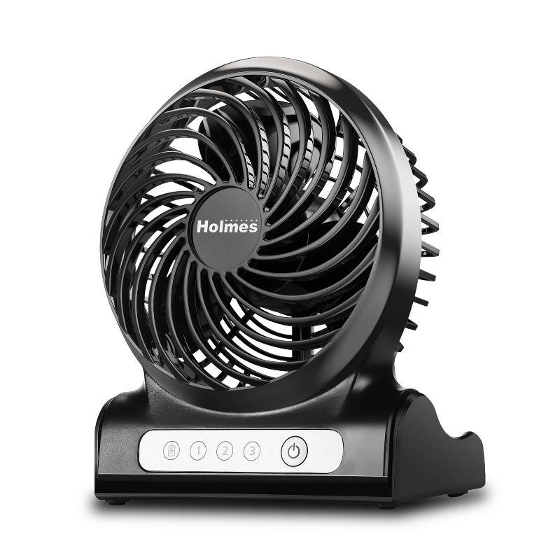 small black fan on a flat stand