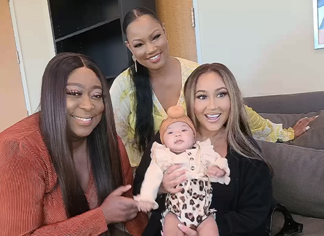 three women with baby Monaco