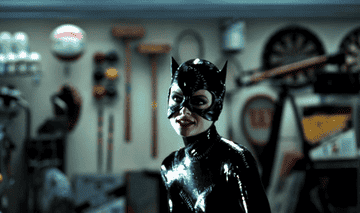 Catwoman brandishing a whip in Batman Returns