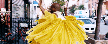 Titus Andromedon twirling in beyonce&#x27;s lemonade dress in TV show Unbreakable Kimmy Schmidt