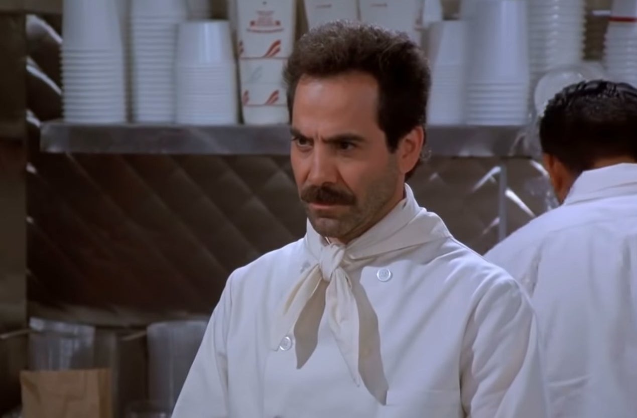 The Soup Nazi standing in his shop in &quot;Seinfeld&quot;