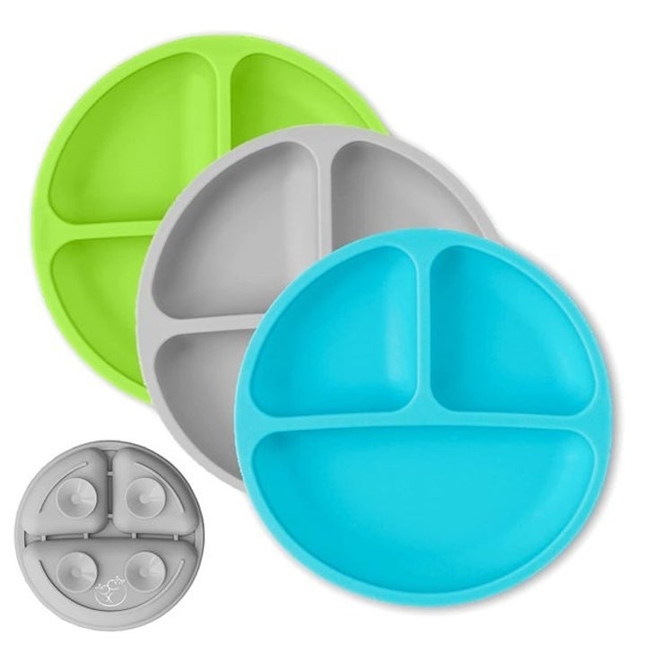 Set of three toddler plates showing suction bottom