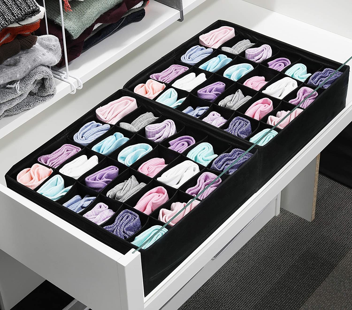 Two drawer organizers inside of a drawer