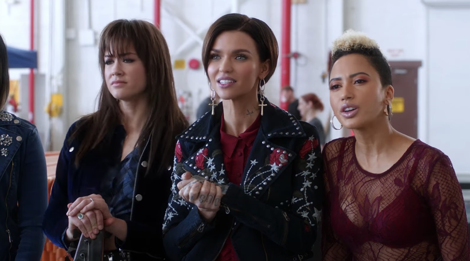 Ruby Rose with two female bandmates.