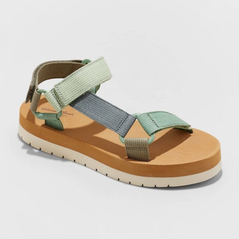 platform sporty sandals with different blue straps across ankle and toes