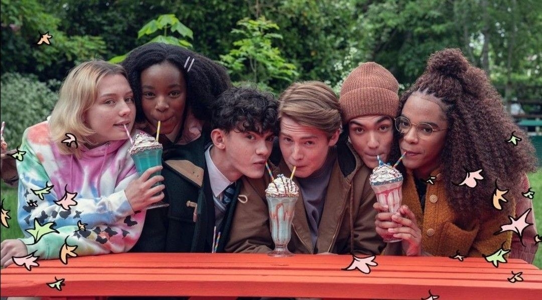 The cast of Heartstopper drinking milkshakes together
