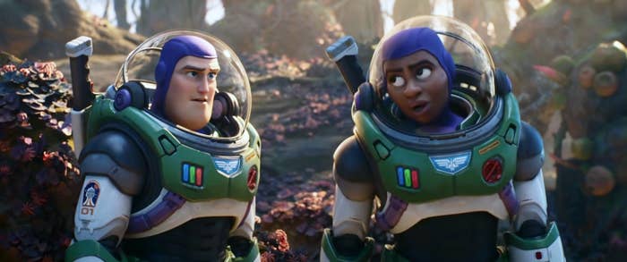 Chris Evans as Buzz Lightyear stands next to Uzo Aduba as Alisha Hawthorne in &quot;Lightyear&quot;