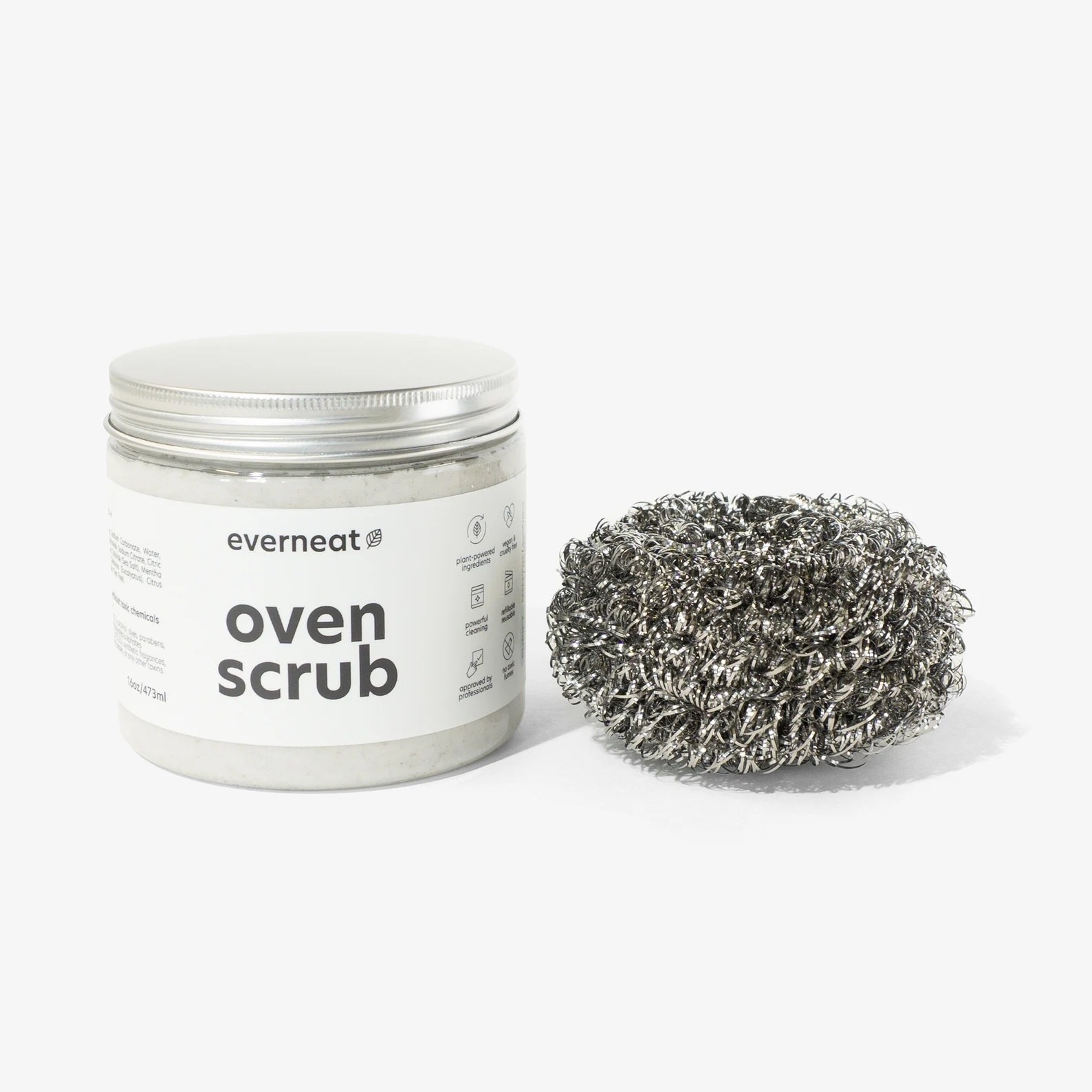 A white jar of oven cleaner and a silver metal sponge