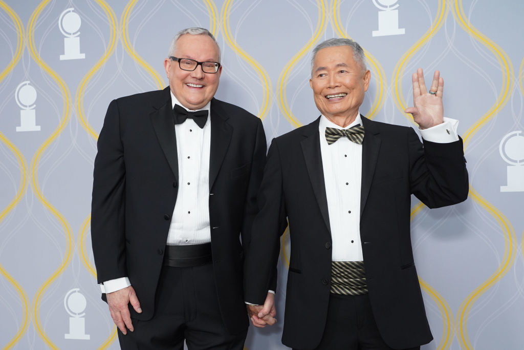 Closeup of George Takei and his partner