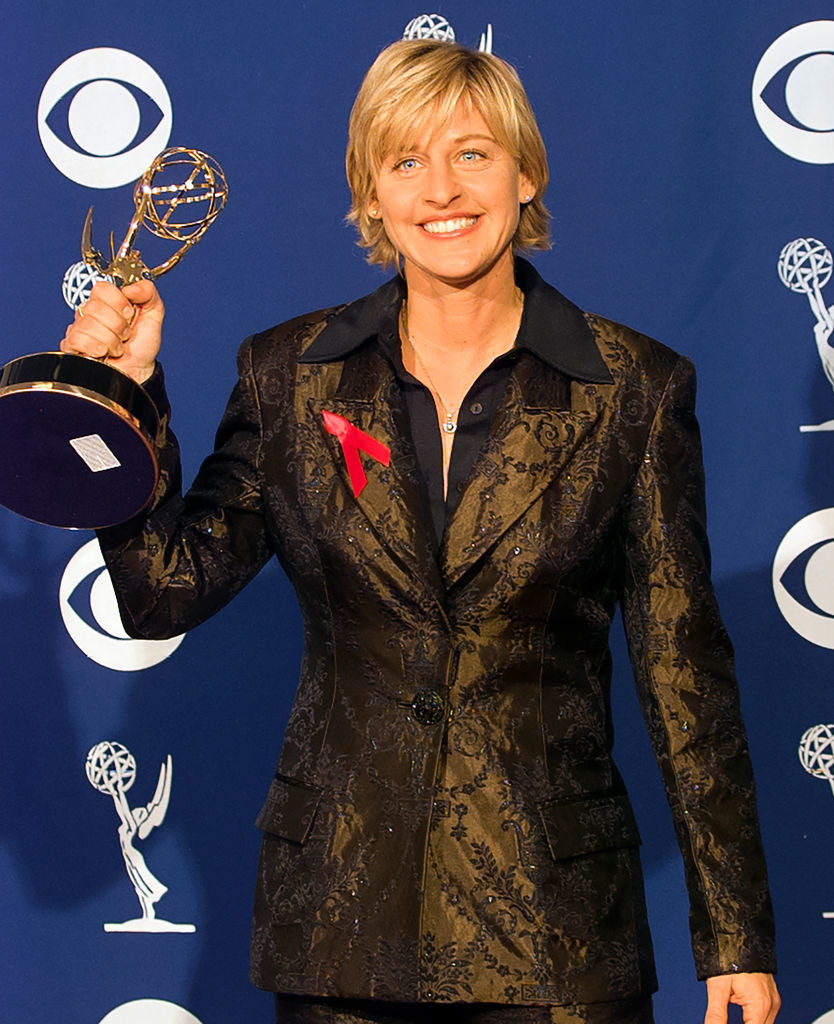 Ellen Degeneres holding an Emmy award