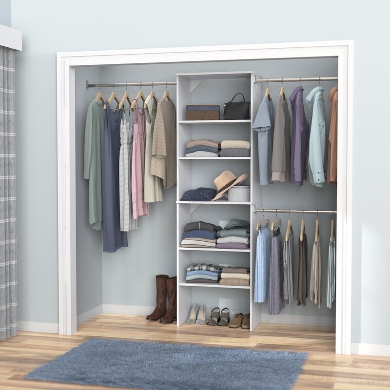 A white closet organizer system