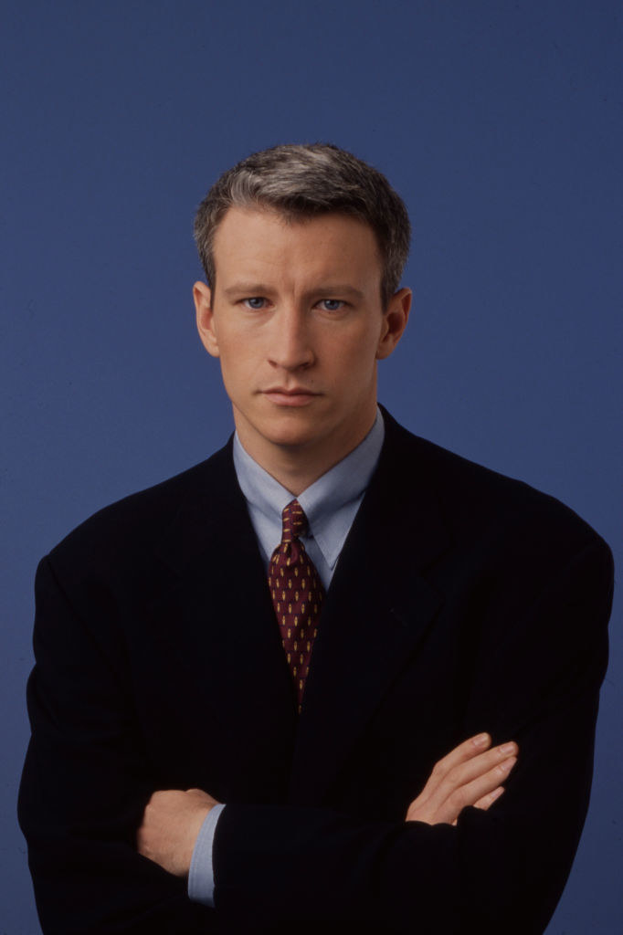 Young Anderson Cooper crossing his arms