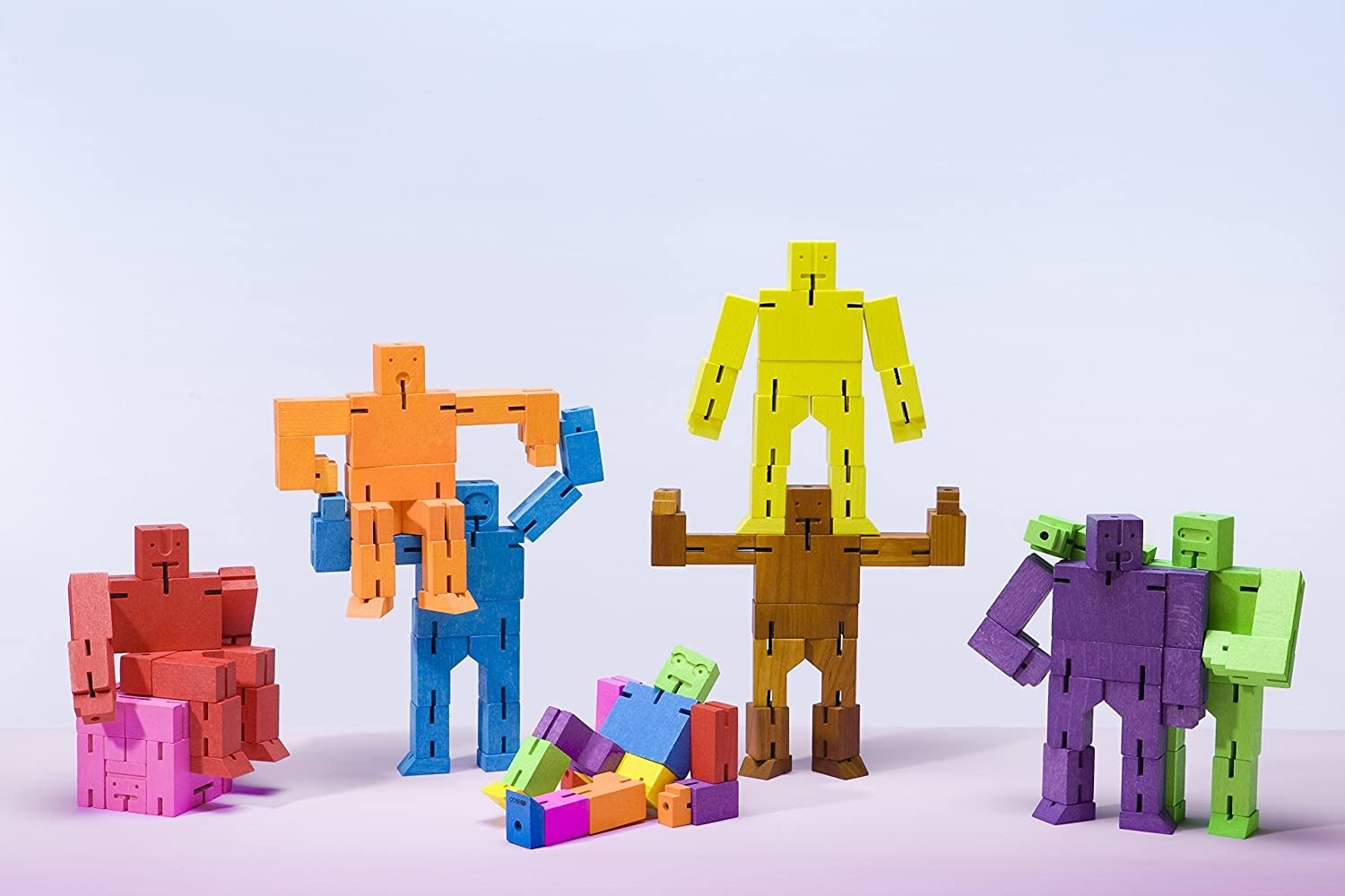 several cubebots in different colors and positions