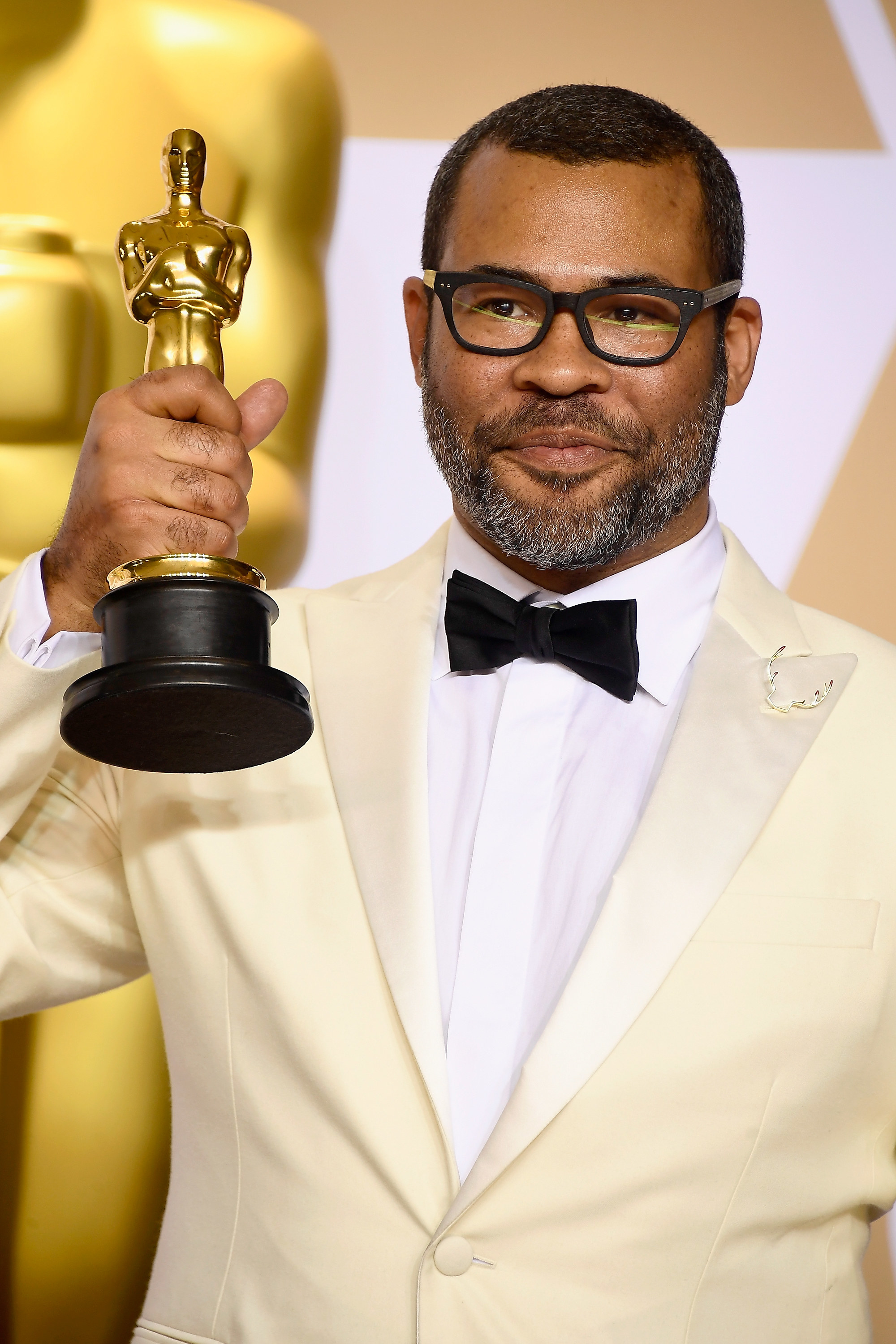 Jordan Peele with his Oscar for Get Out