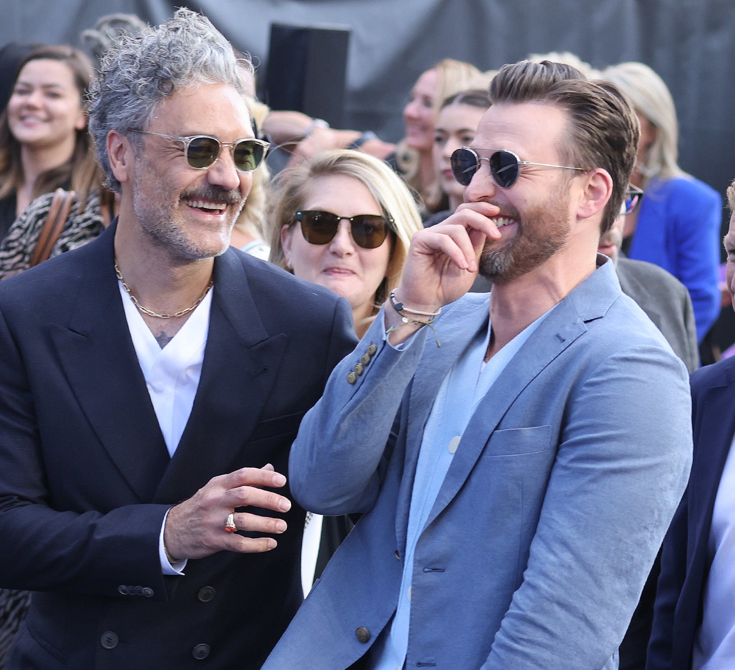 Taika Waititi and Chris Evans share a joke as they attend the &quot;Lightyear&quot; UK Premiere at Cineworld Leicester Square
