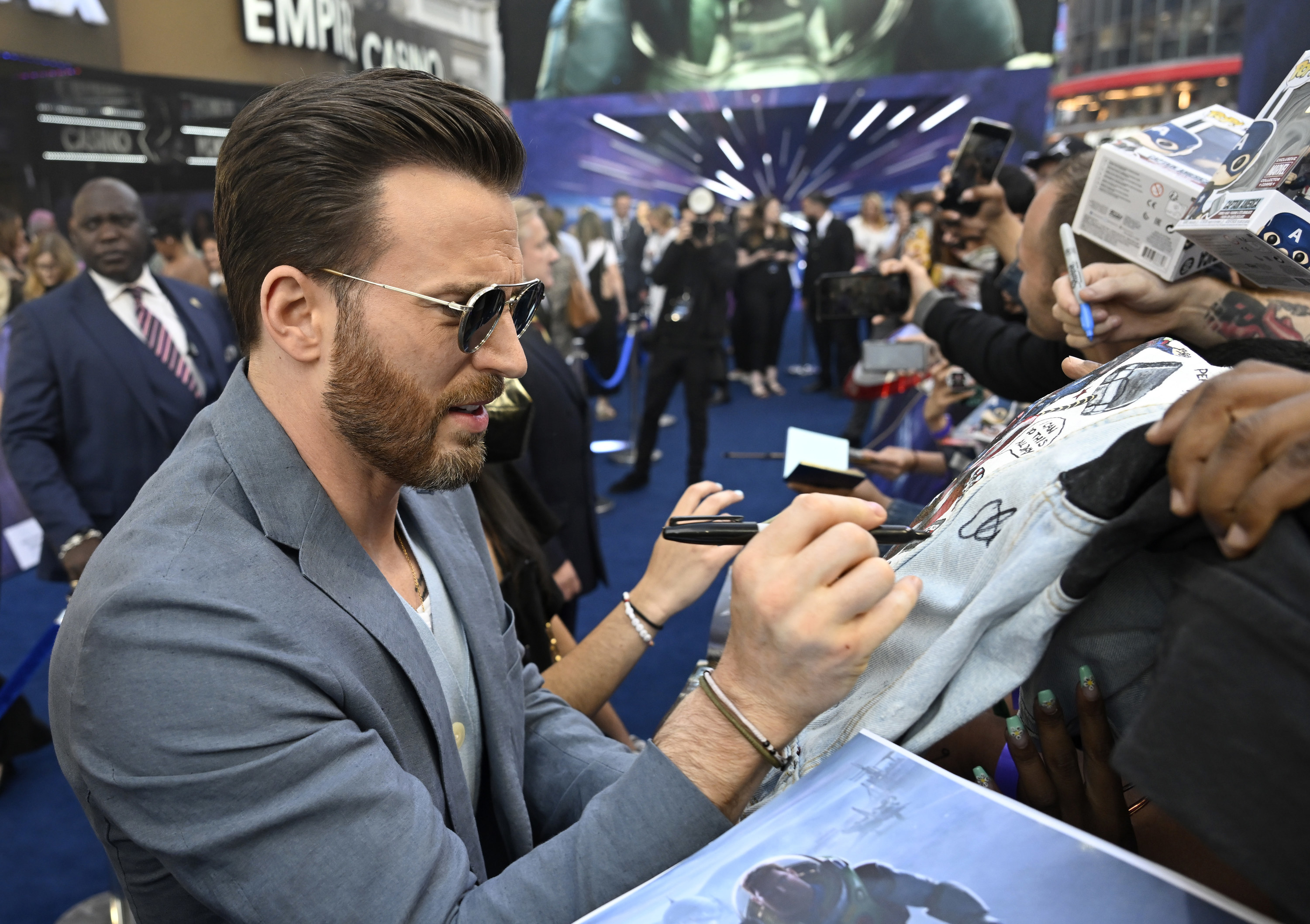 Chris Evans signing autographs