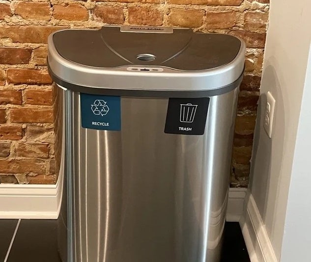 A user review photo of the trash can