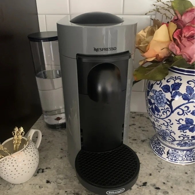 A user review image of the coffee machine in gray