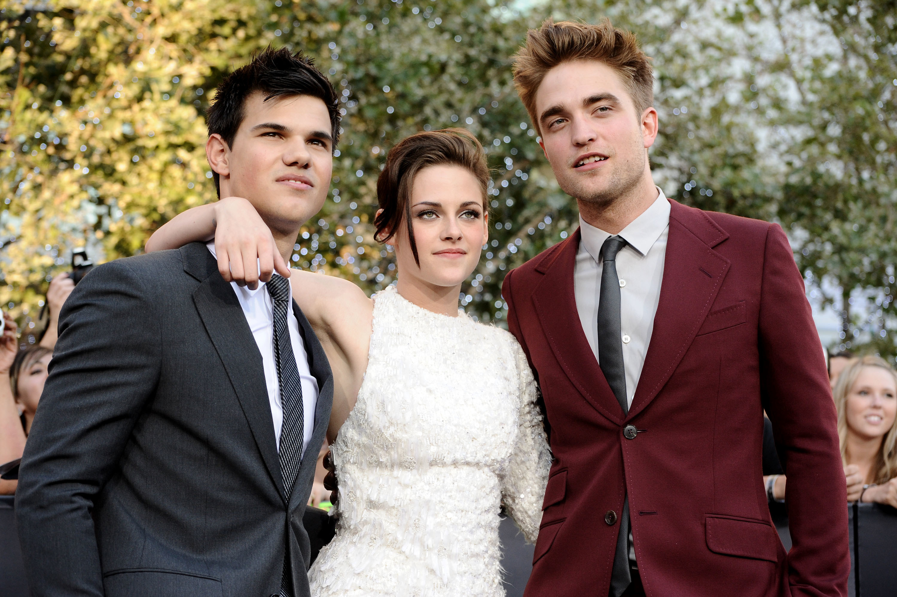 Kristen with Taylor Lautner and Rob Pattinson at a Twilight series film premiere