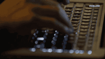 A person typing on a computer
