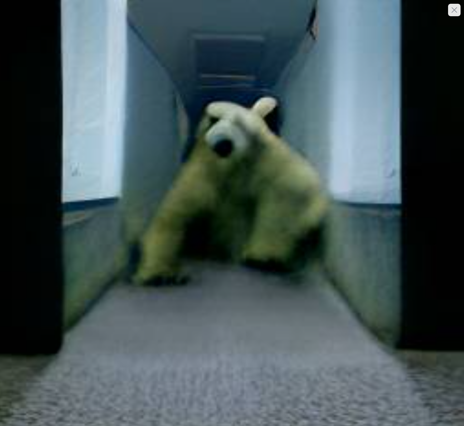 AI generated photo of a polar bear charging at you down a hallway