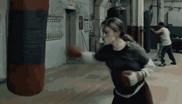A woman practicing boxing