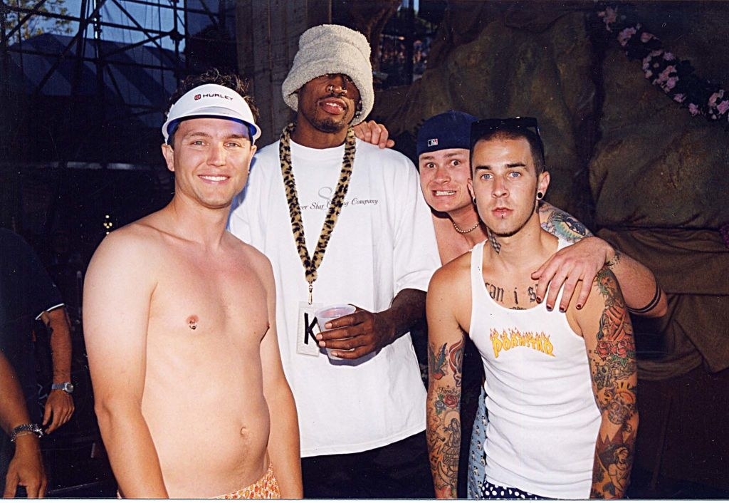 Shirtless with Dennis Rodman and the other members of Blink-182, including Travis Barker