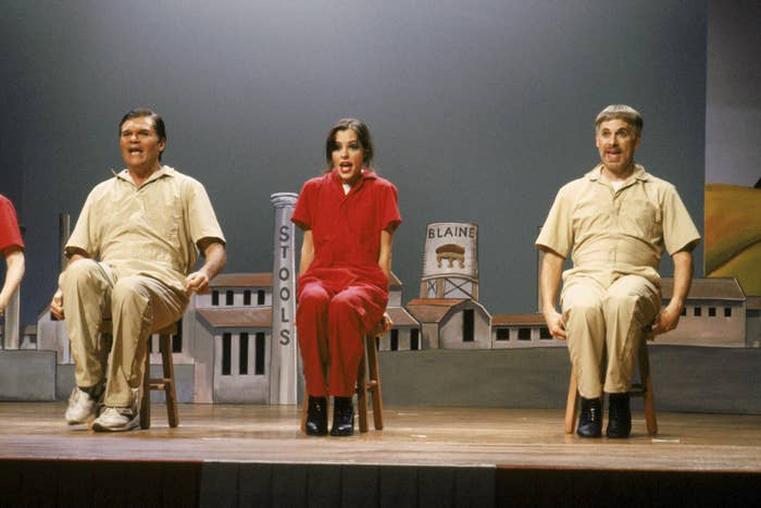 Fred Willard, Parker Posey, and Christopher Guest performing onstage
