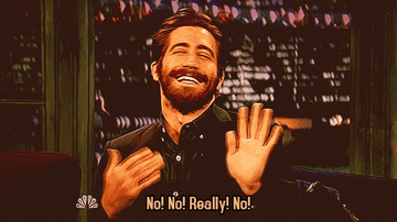 GIF of Jake Gyllenhaal smiling and saying no no, really, no