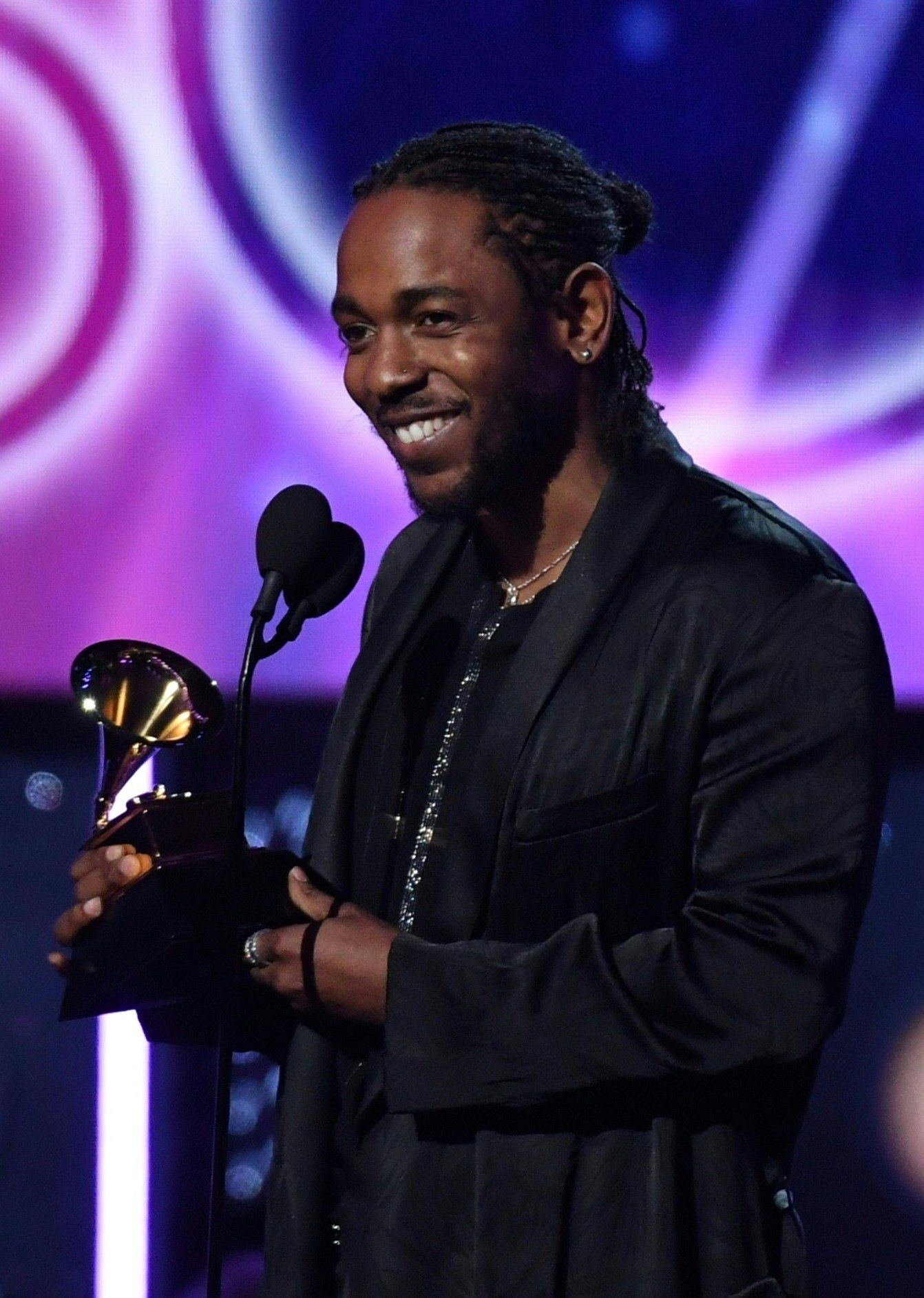 Kendrick receiving an award