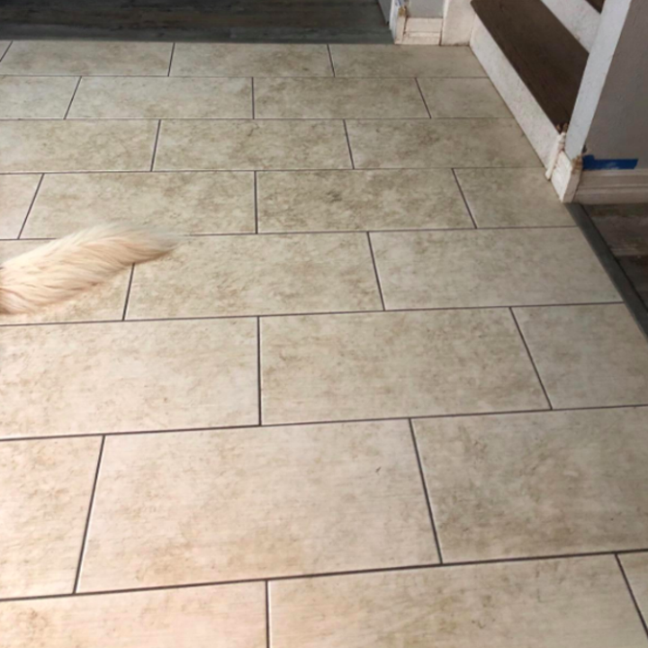 A reviewer's tile floor looking dirty