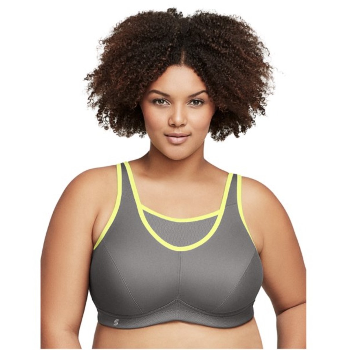A person wearing a grey and yellow sports bra