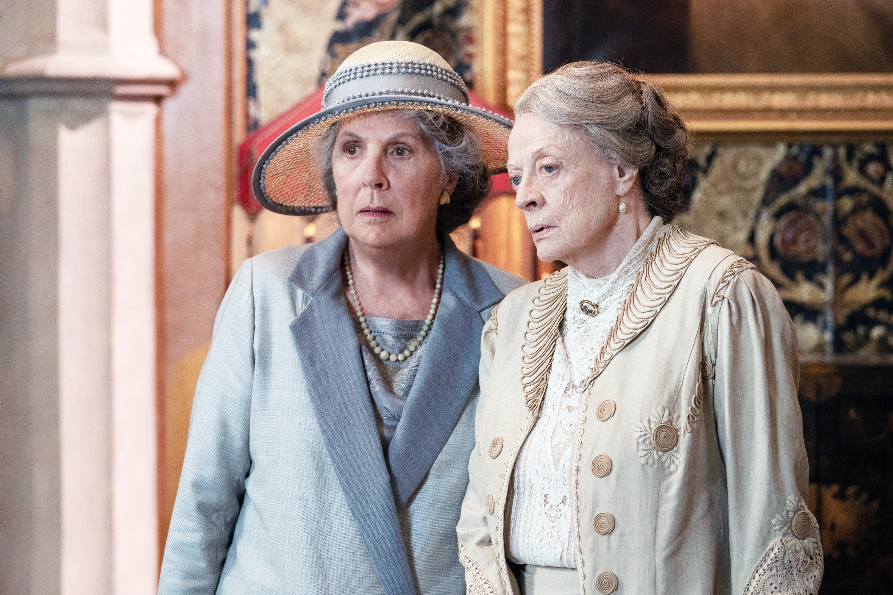 Penelope Wilton and Maggie Smith stand together