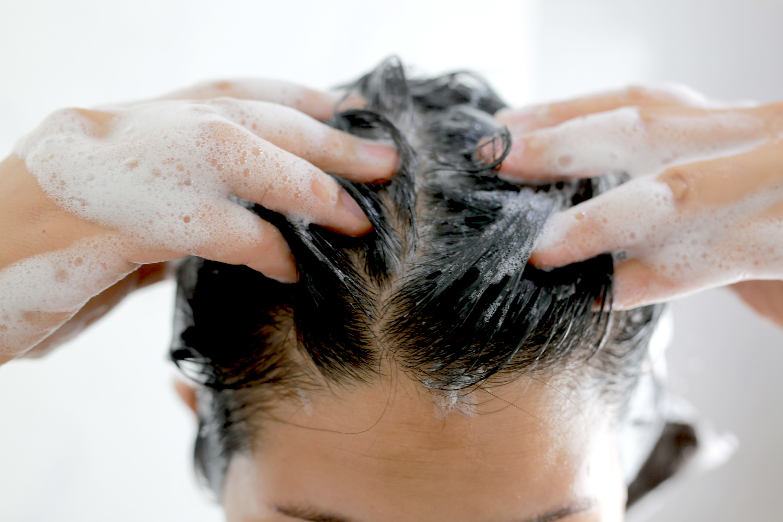 A woman washing her hair