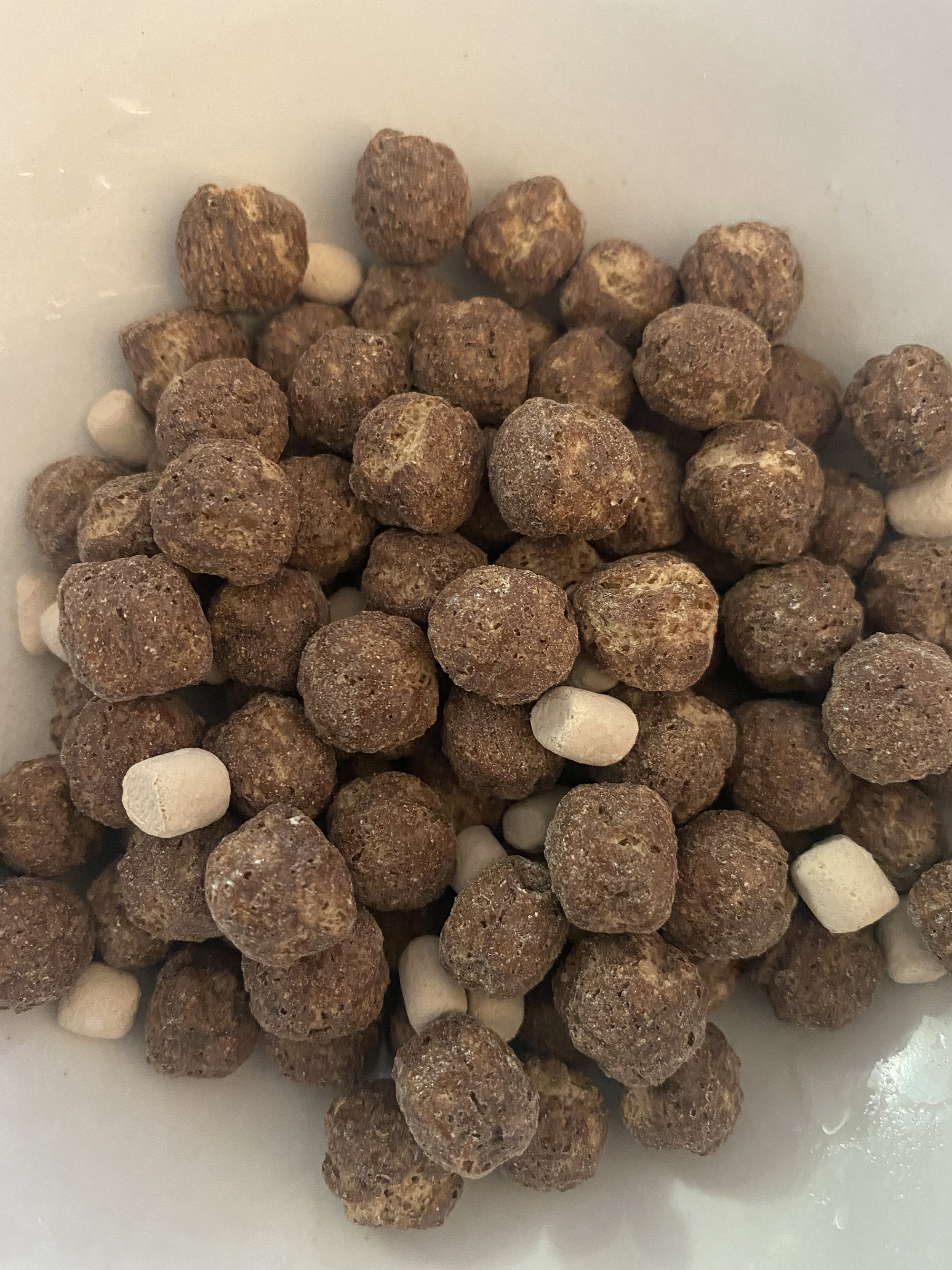 round pieces of cereal with small marshmallows