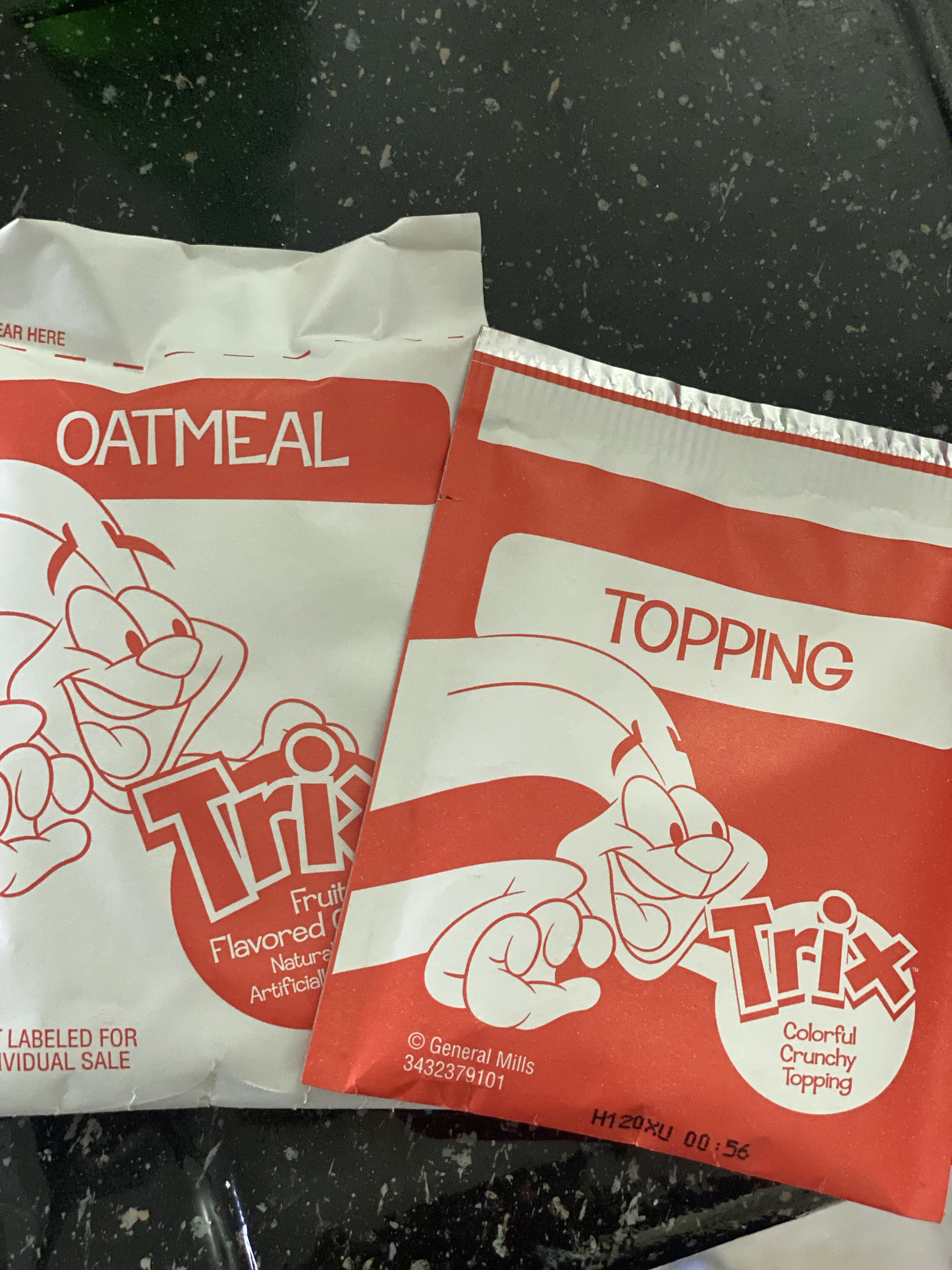 packet of Trix oatmeal and packet of topping