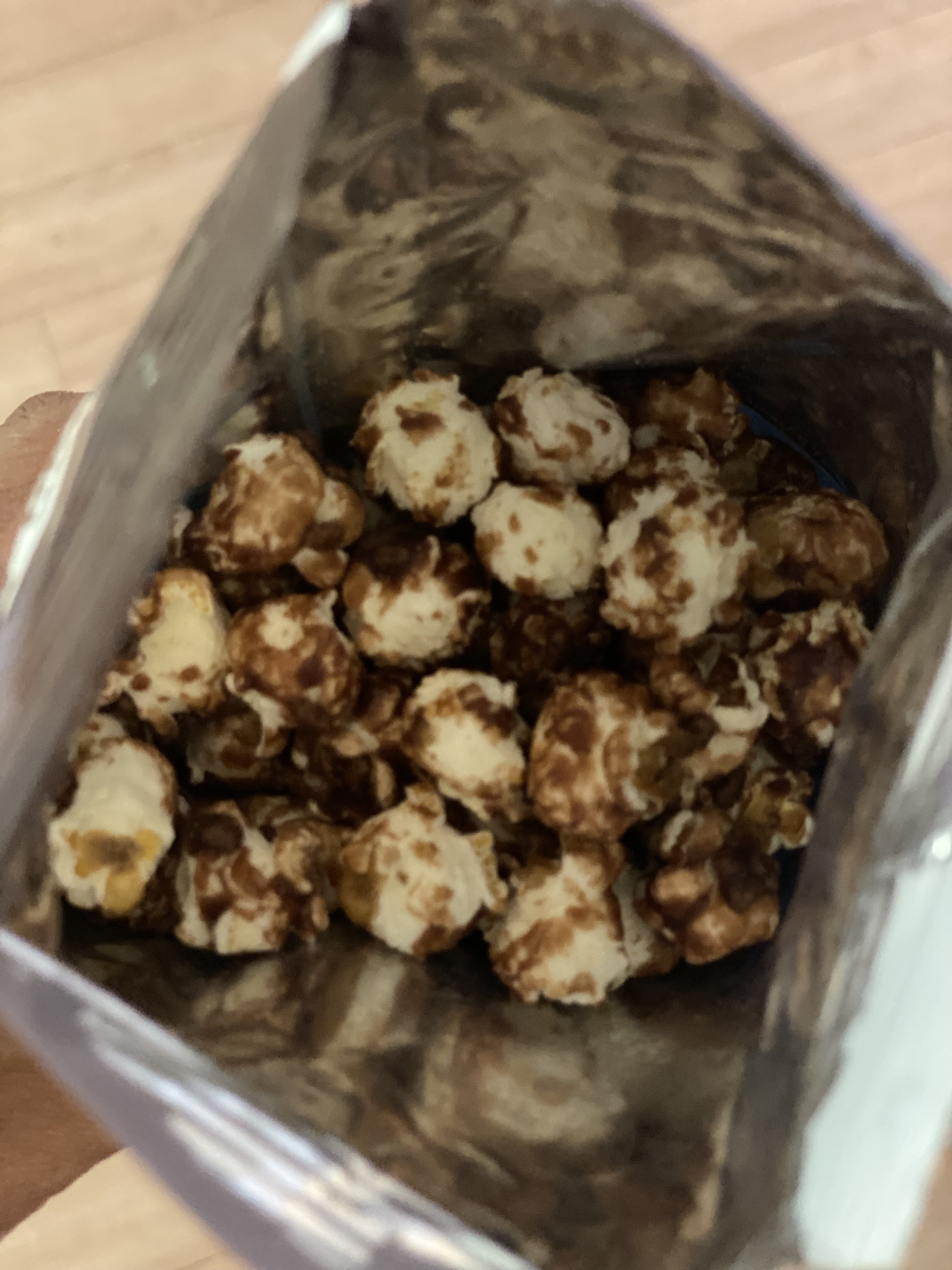 open bag with popcorn inside