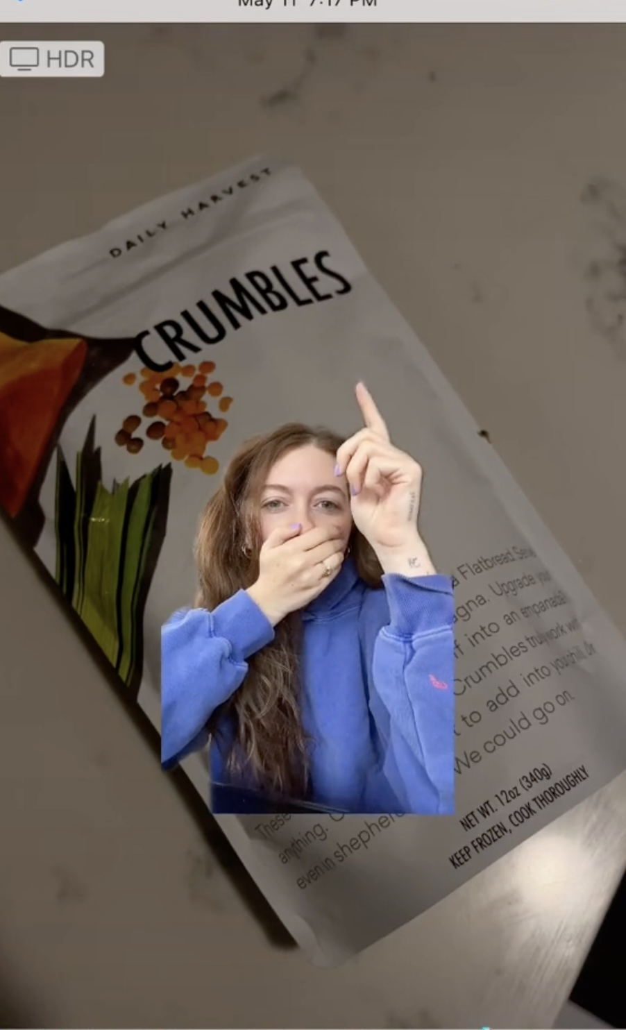 Jenna pointing to the crumbles in her tiktok