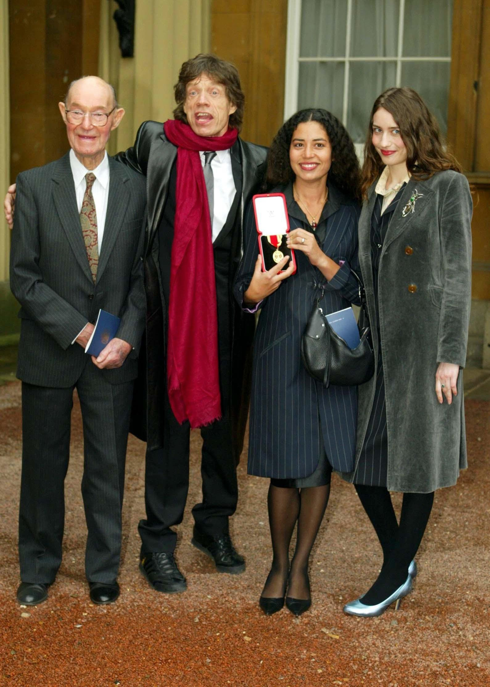 Rolling Stone Sir Mick Jagger with father, Joe, and daughters Elizabeth and Karis