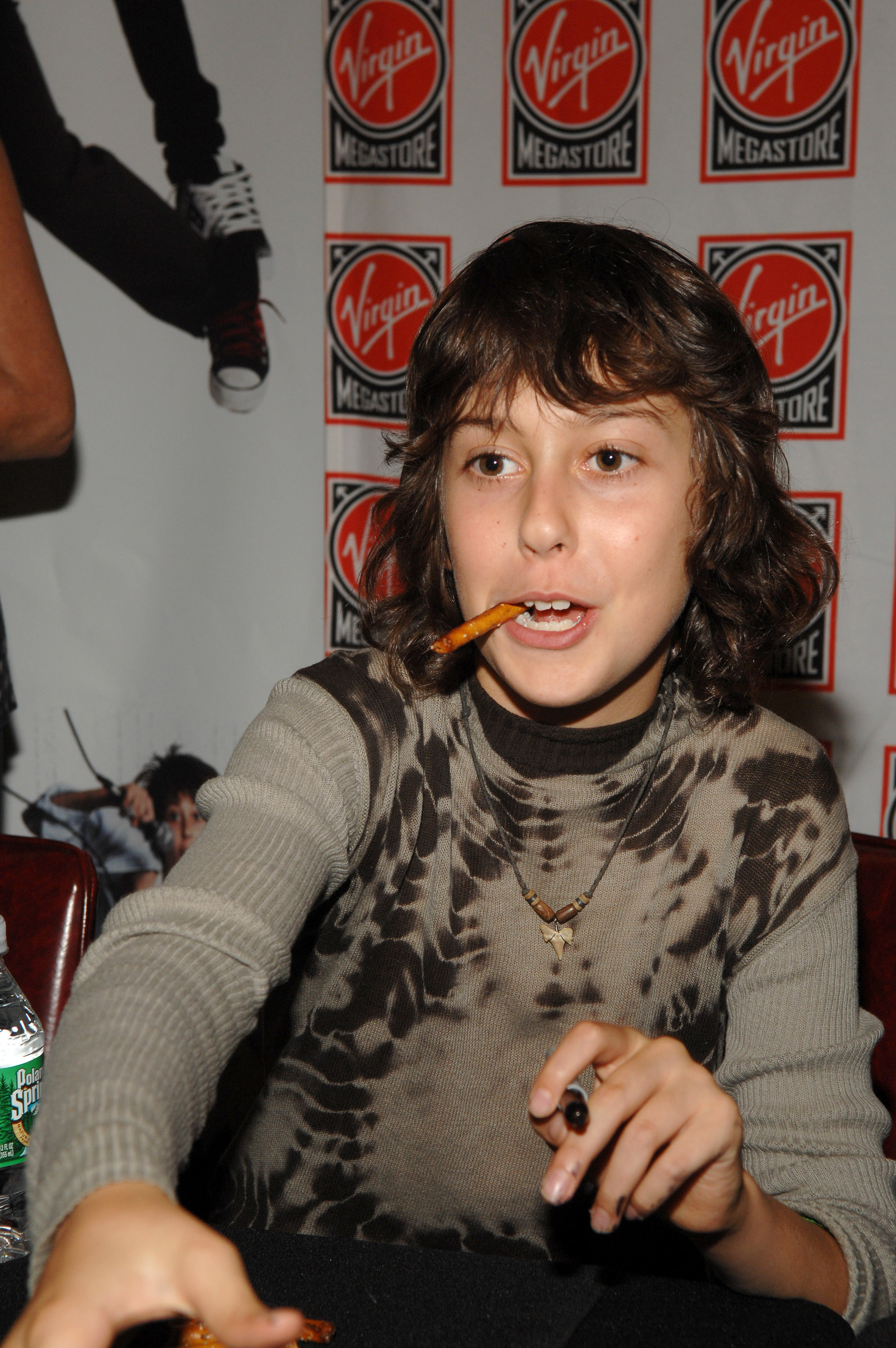 Nat Wolff signing autographs at a Nickelodeon event