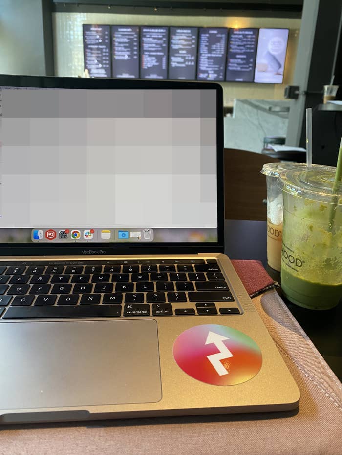 laptop at a table with a coffee and smoothie