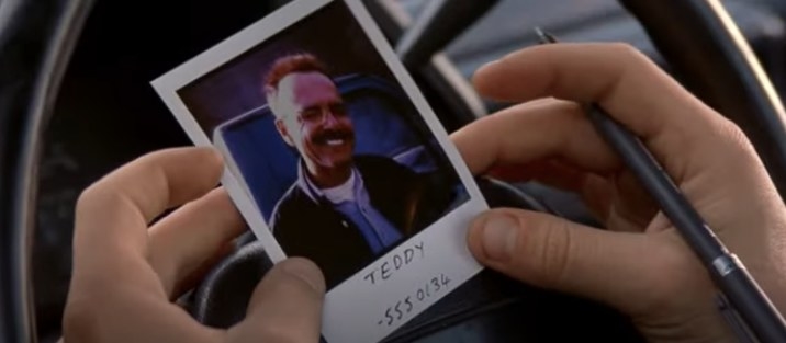 Teddy&#x27;s phone number on a polaroid in Memento