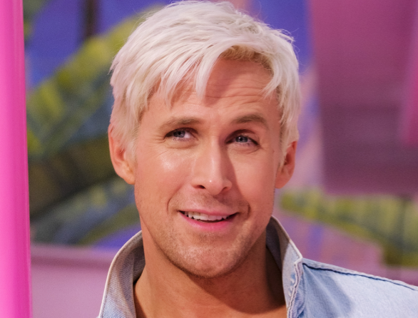 close up of ryan as the ken doll with platinum hair