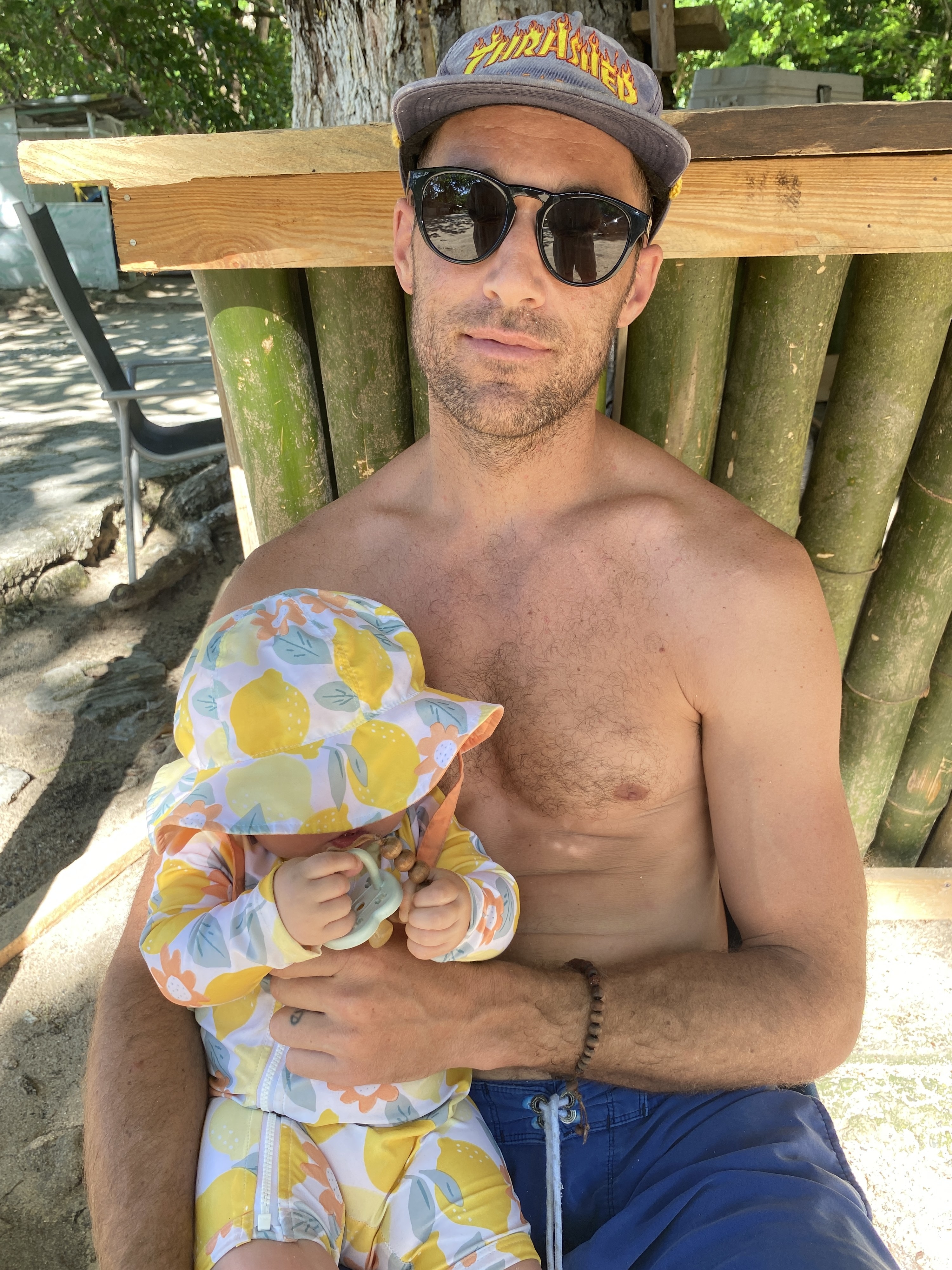 Man with baby at the beach