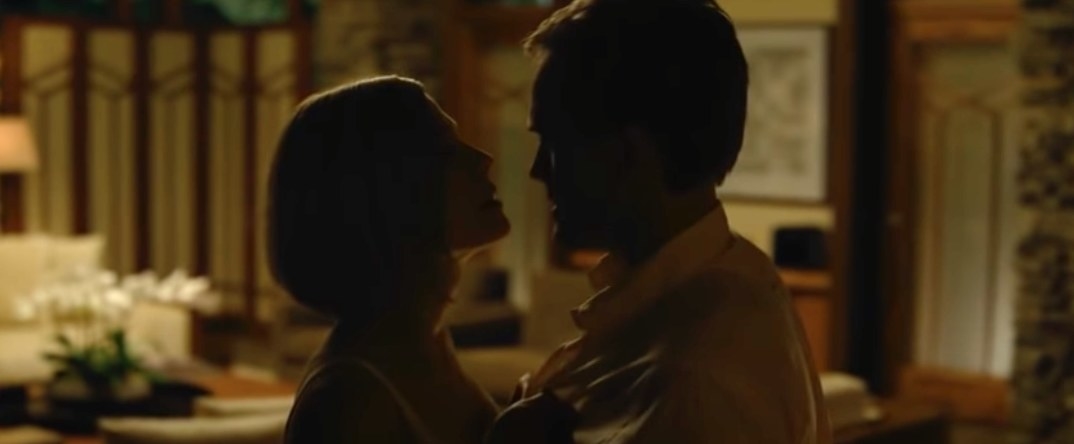Rosamund Pike and Neil Patrick Harris about to kiss in Gone Girl film