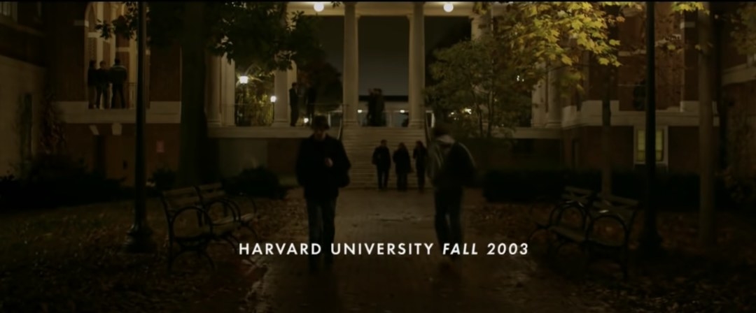 People walking outside a university campus in The Social Network film