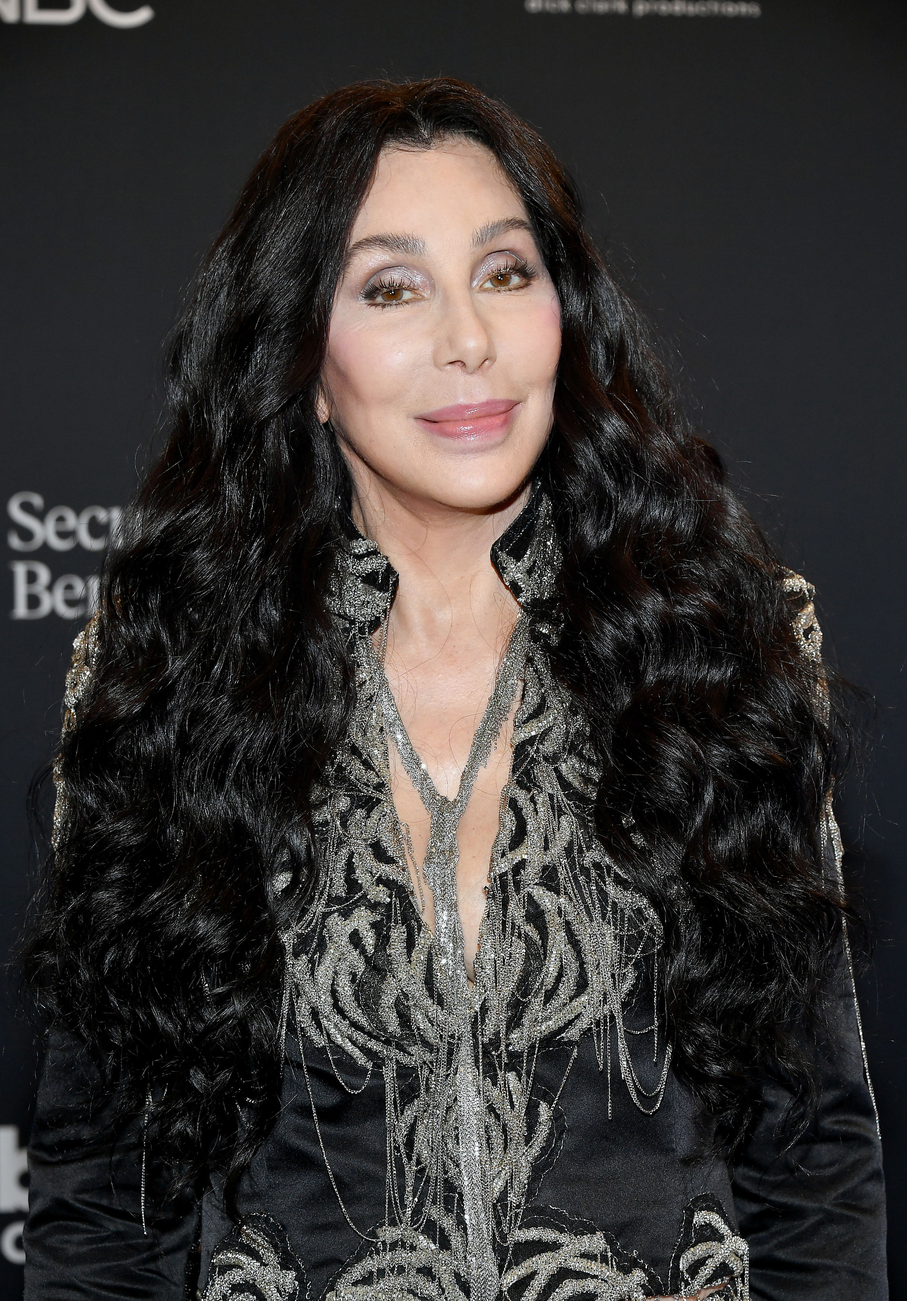 In this image released on October 14, Cher poses backstage at the 2020 Billboard Music Awards, broadcast on October 14, 2020