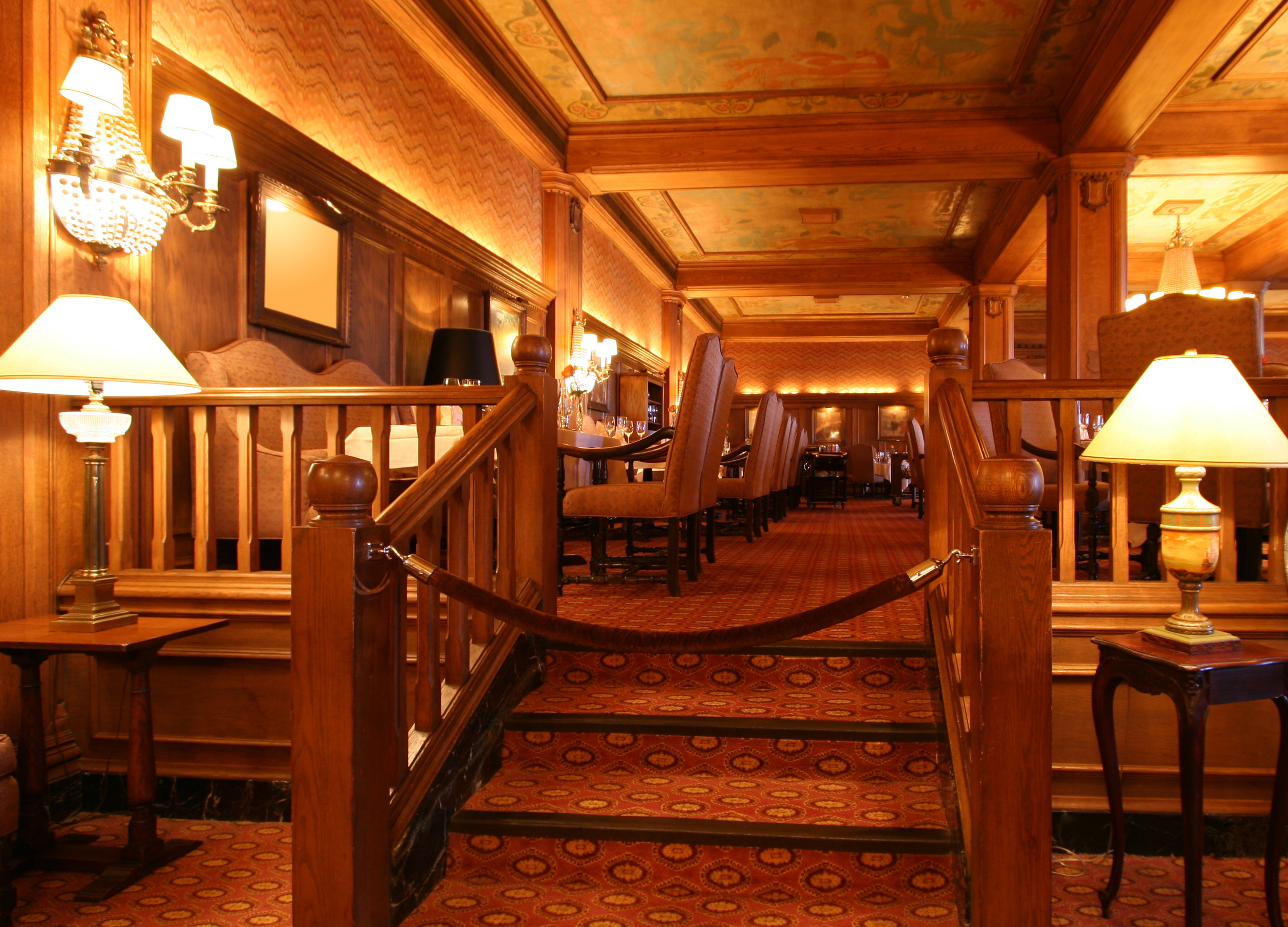 a roped off restaurant section that is carpeted