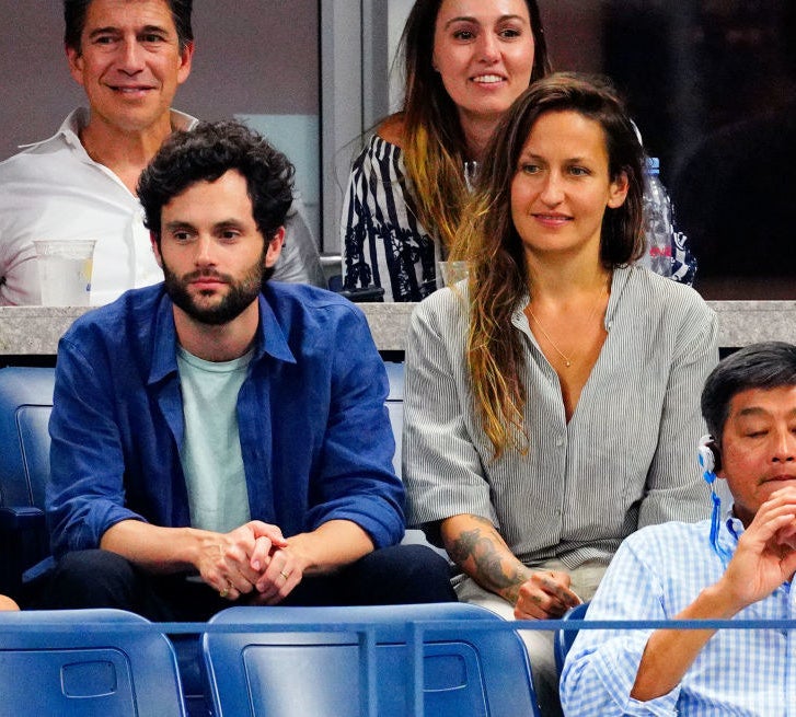 Penn and Domino sitting in the stands for a game