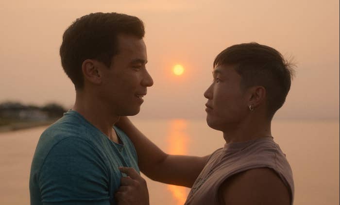 Noah (Joel Kim Booster) and Will (Conrad Ricamora) looking at each other with sun setting in the background